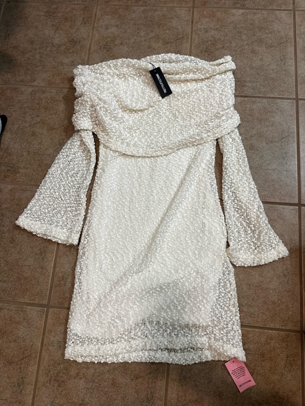 PrettyLittleThing Cream/White Textured Off-Shoulder Wedding Dress